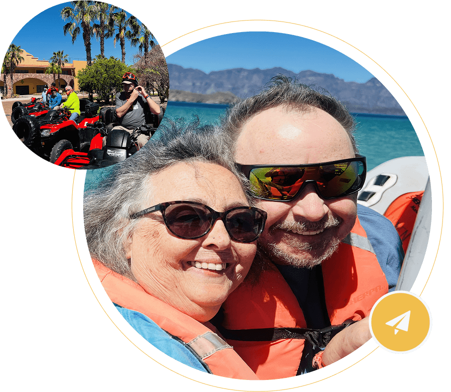 Couple enjoying a sunny outdoor boat ride with smiles and sunglasses.